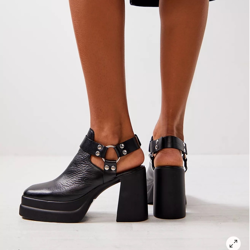 Free People Black Heeled Boots with Sleek Design